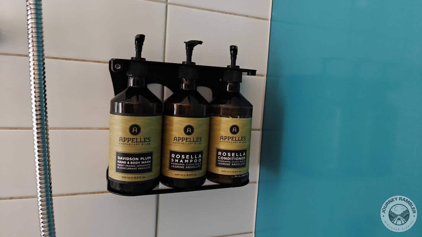 big bottles of shampoo, conditioner and hand and body wash
