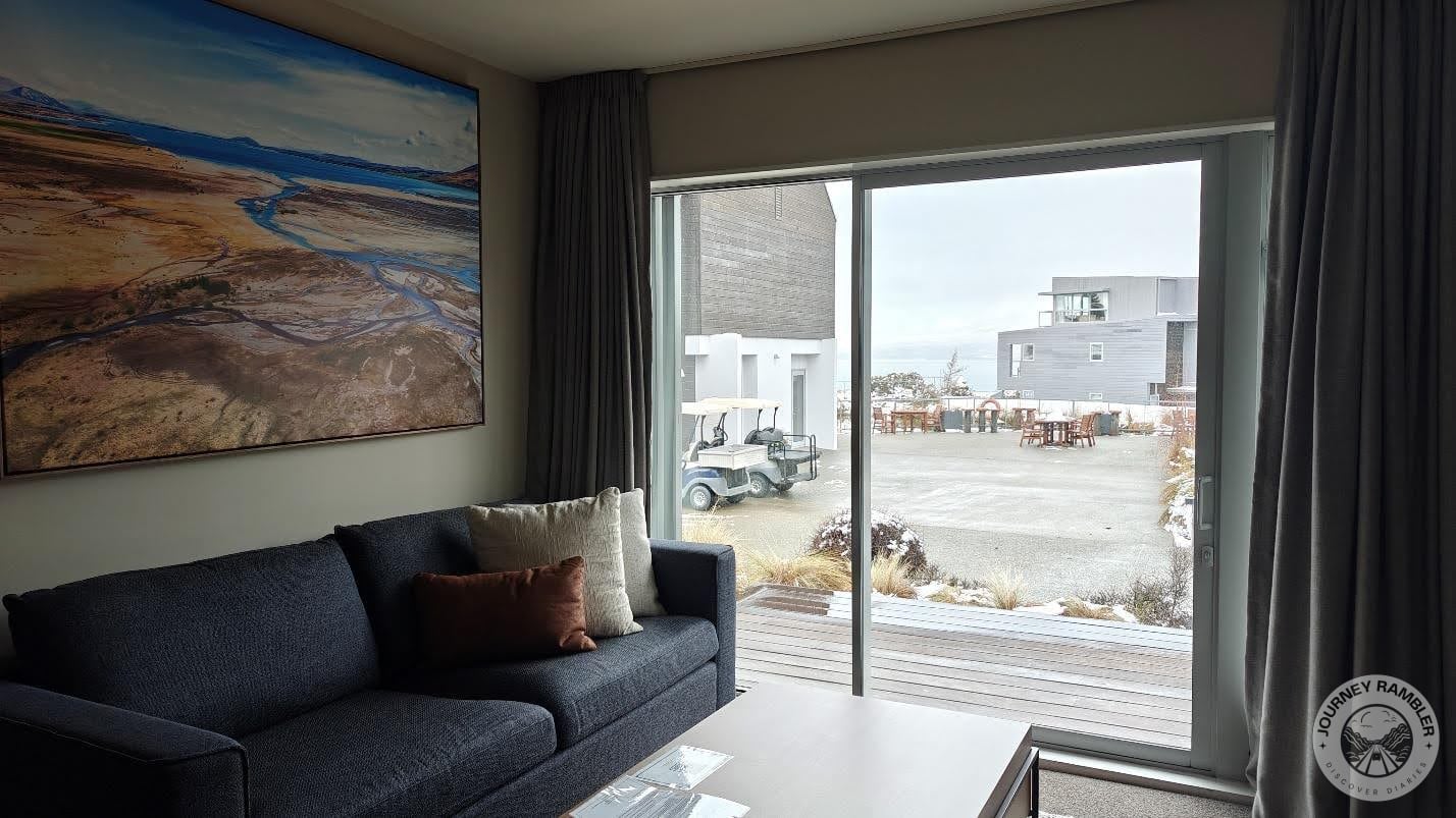 big, bright painting hanging above the sofa