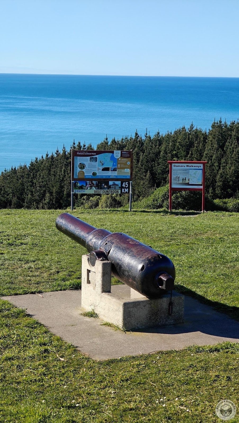 big cannon in the middle of the green lawn