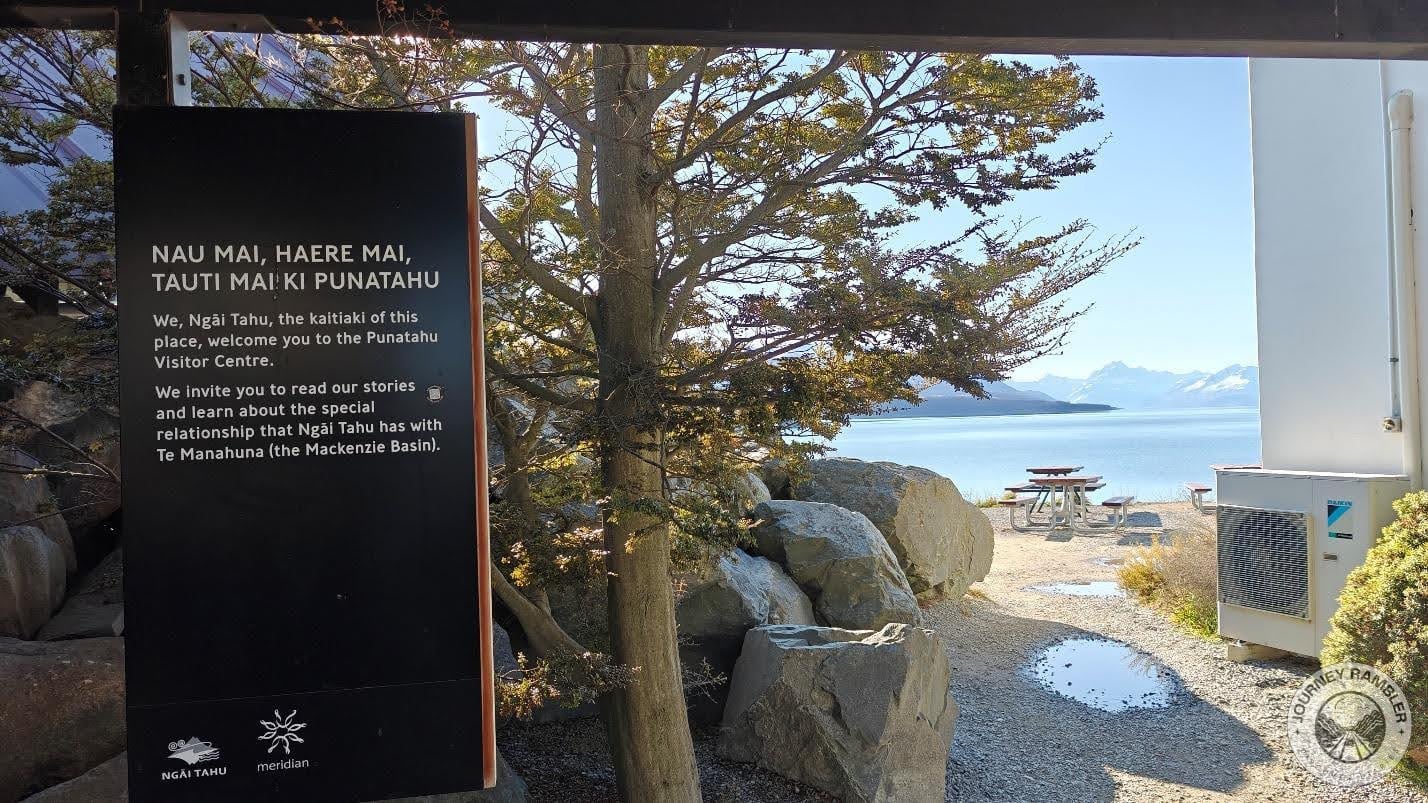 board welcoming all visitors by the local people