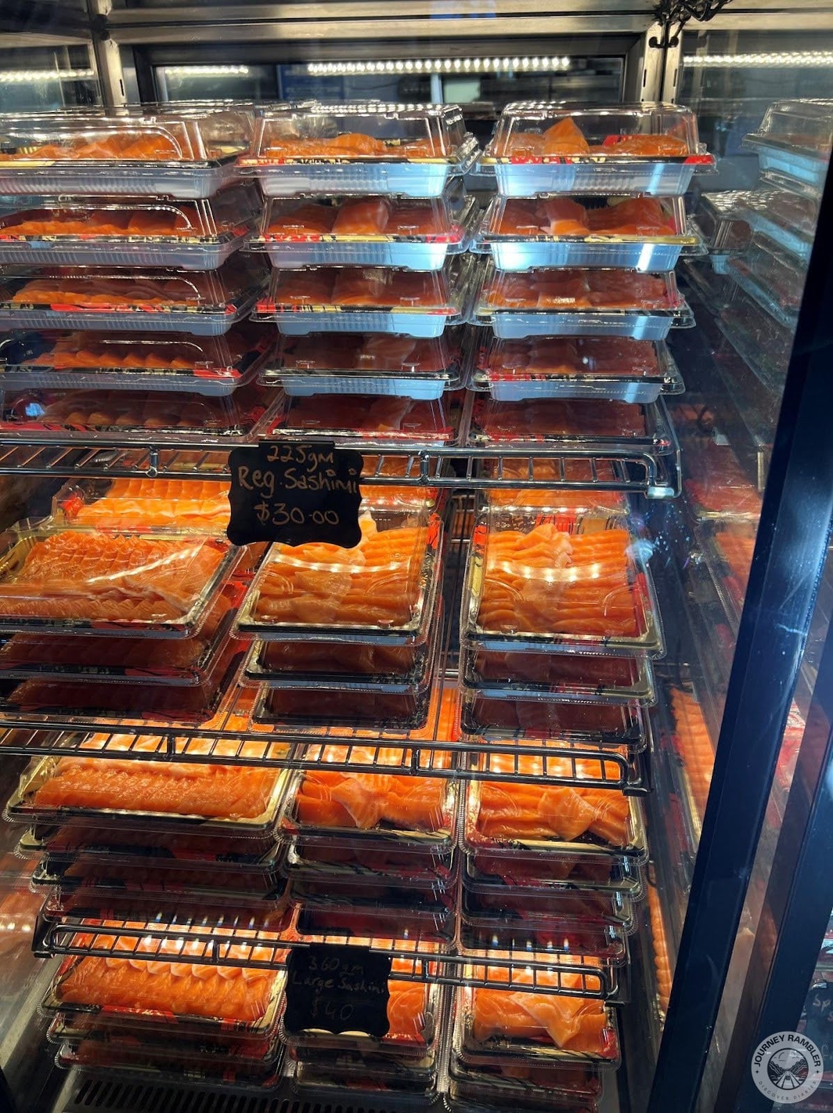 boxes of raw salmon sashimi