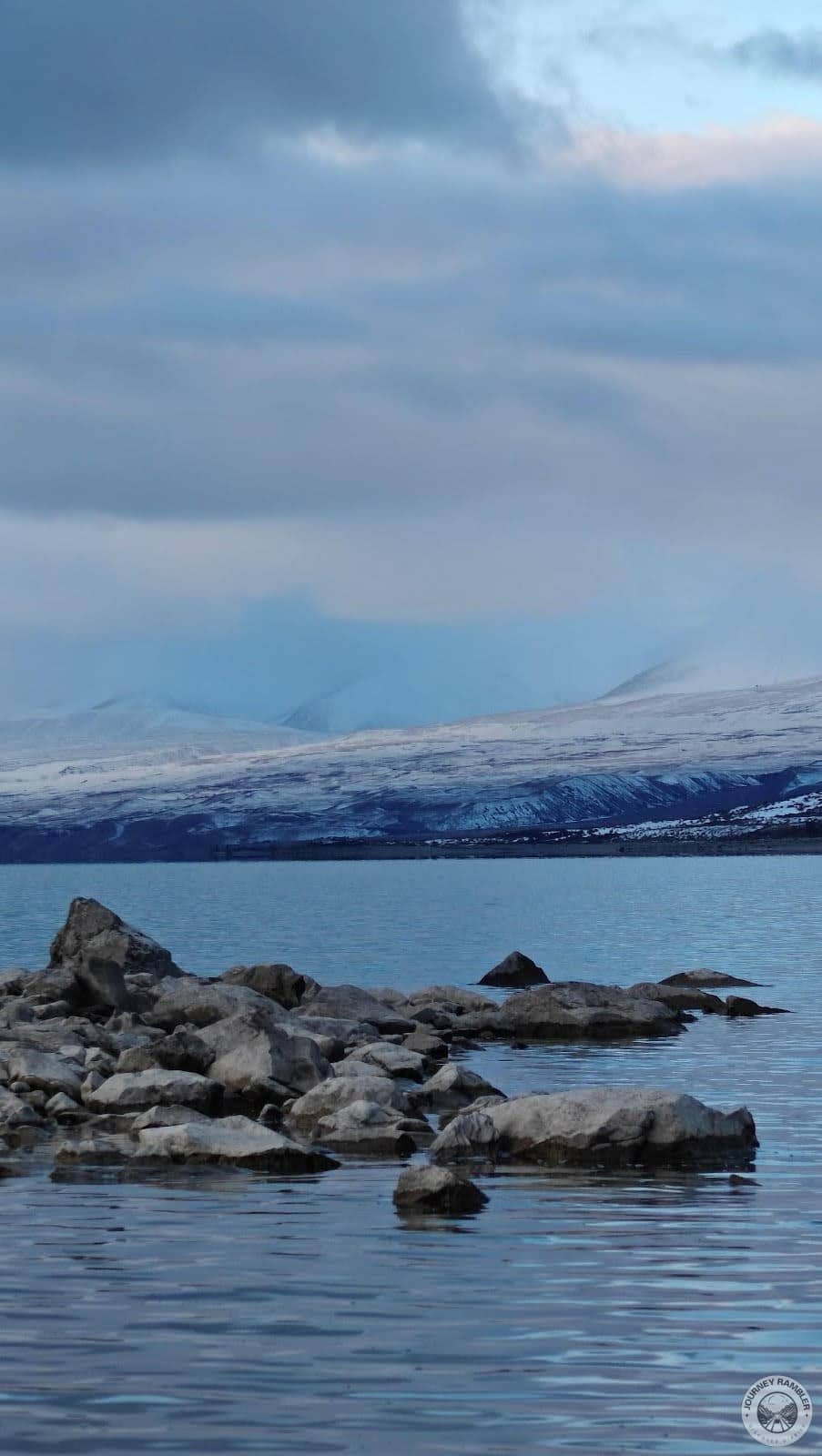 clouds on the surrounding mountains