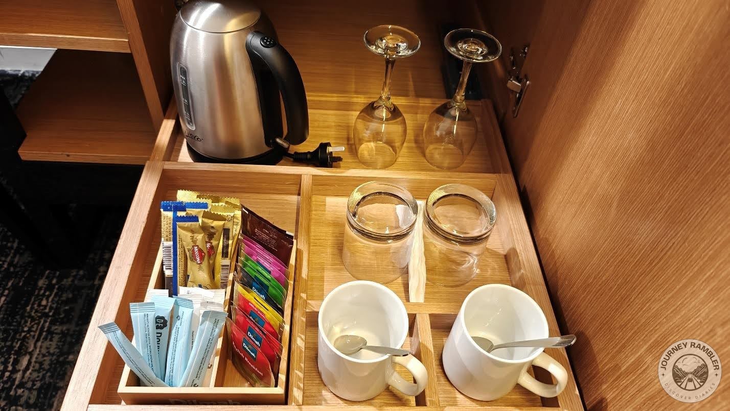 electric kettle, mugs and glasses