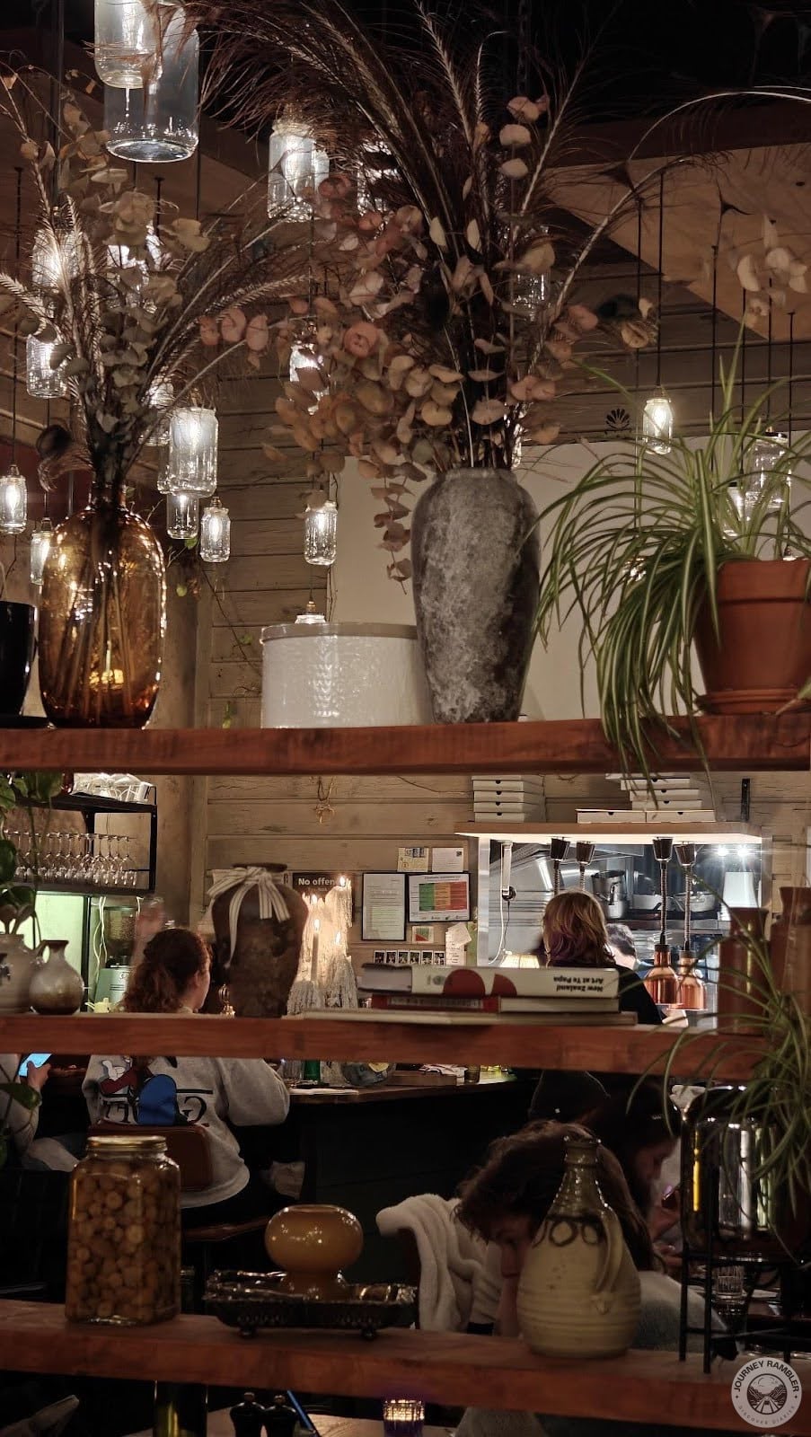 few people were already sitting at the tables and eating their food