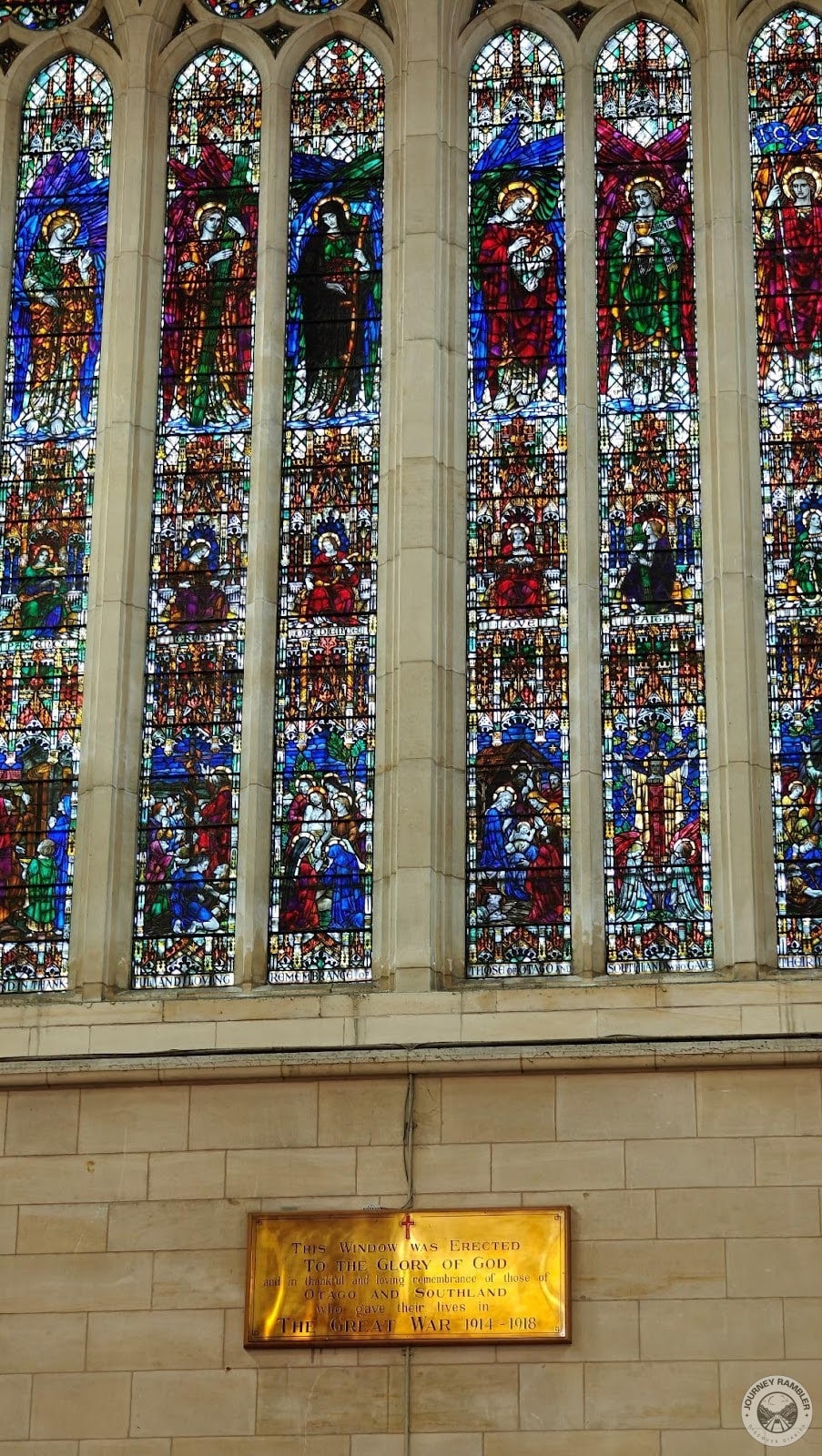 golden colored plaque under the window