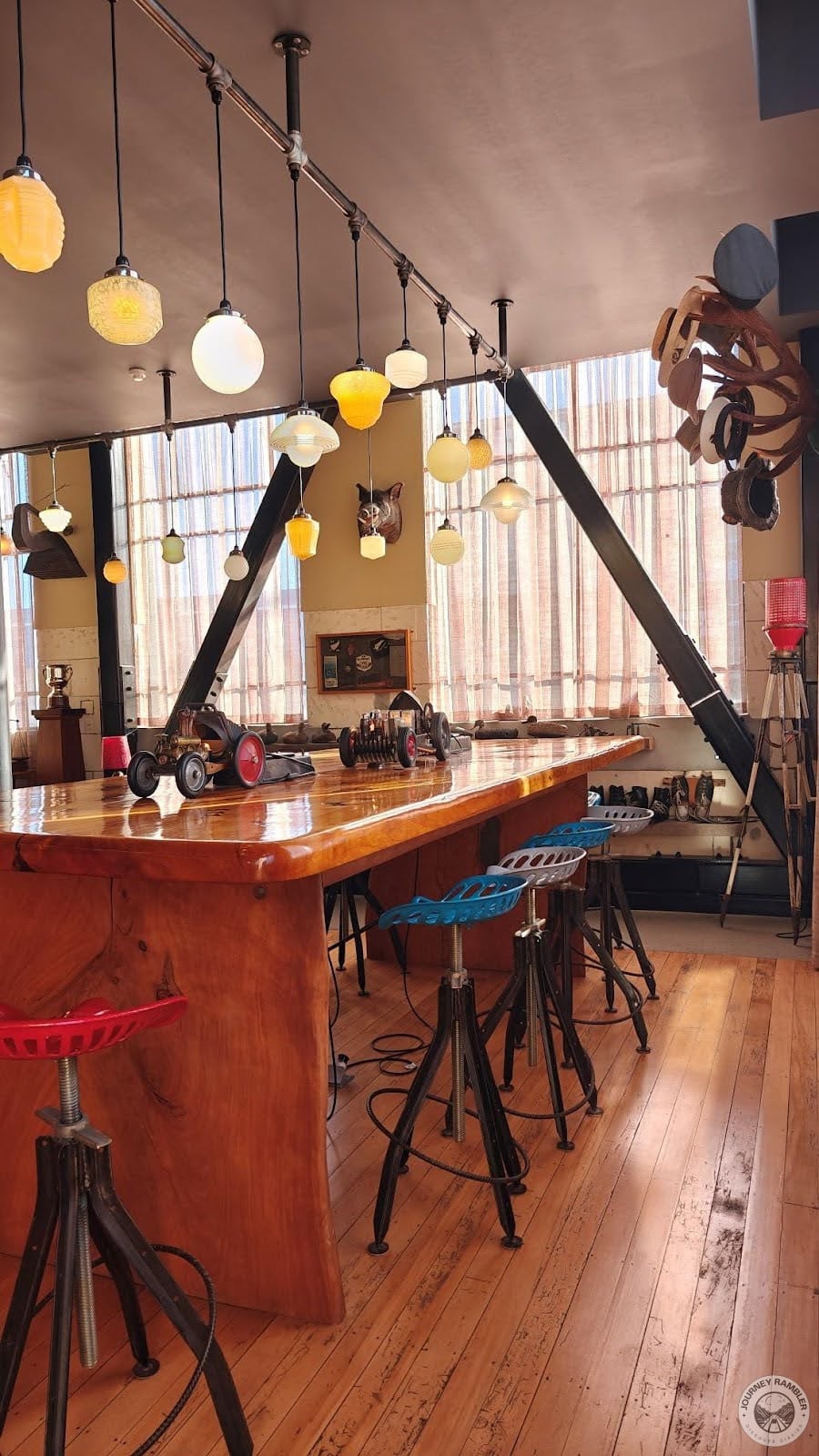 hanging lamps and standing lamps all around the room