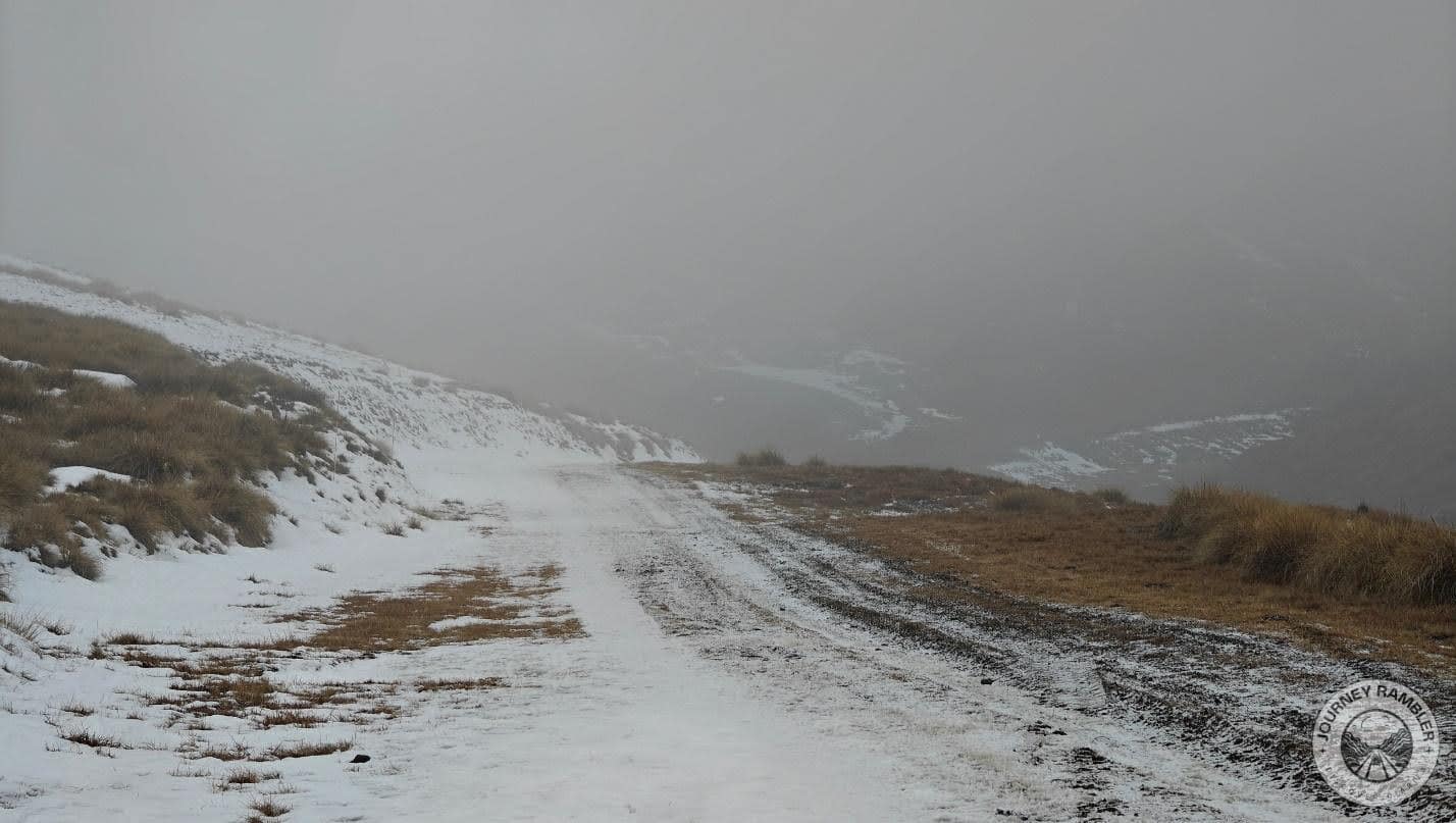 hill gently sloped down from the road again
