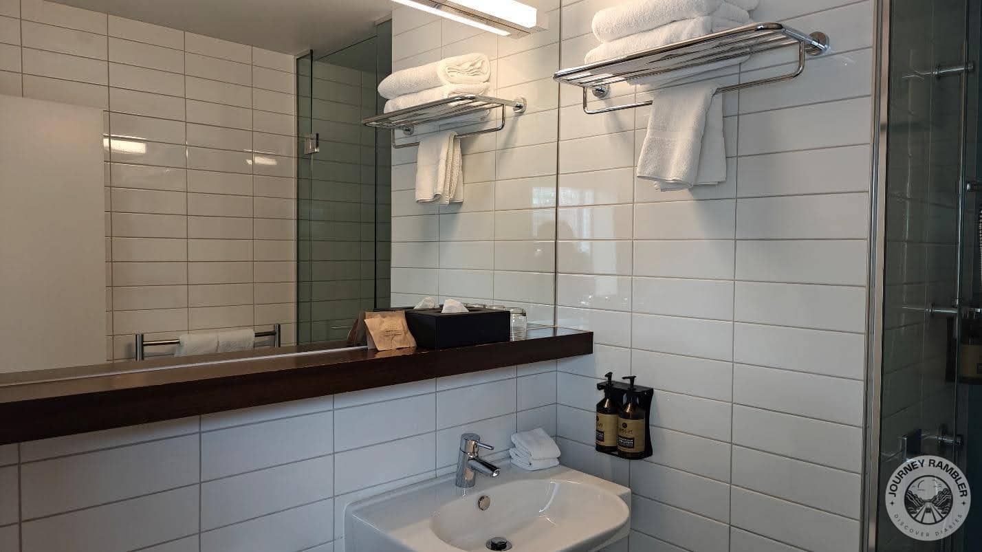 huge mirror above the washbasin