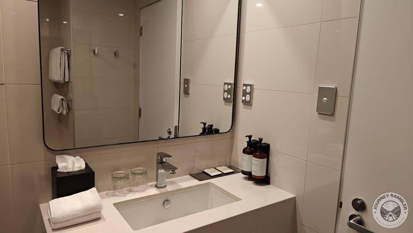 large mirror behind the sink