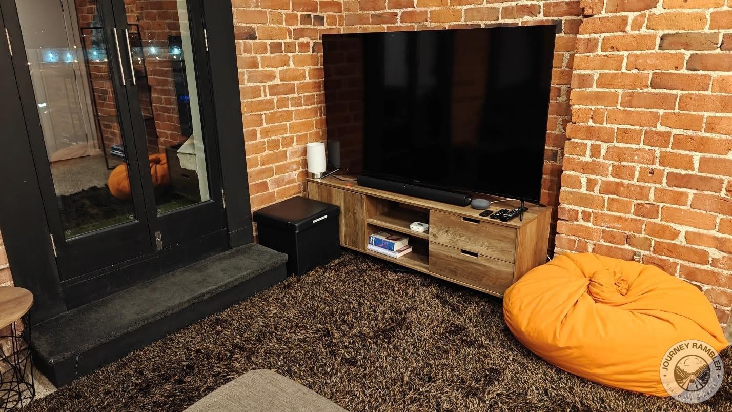 large screen TV and a bean bag