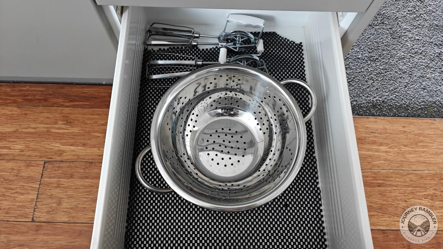 large sieve and a pair of whisks for an electric mixer
