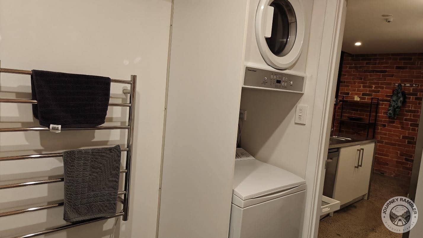 large towel racks, washer and clothes dryer