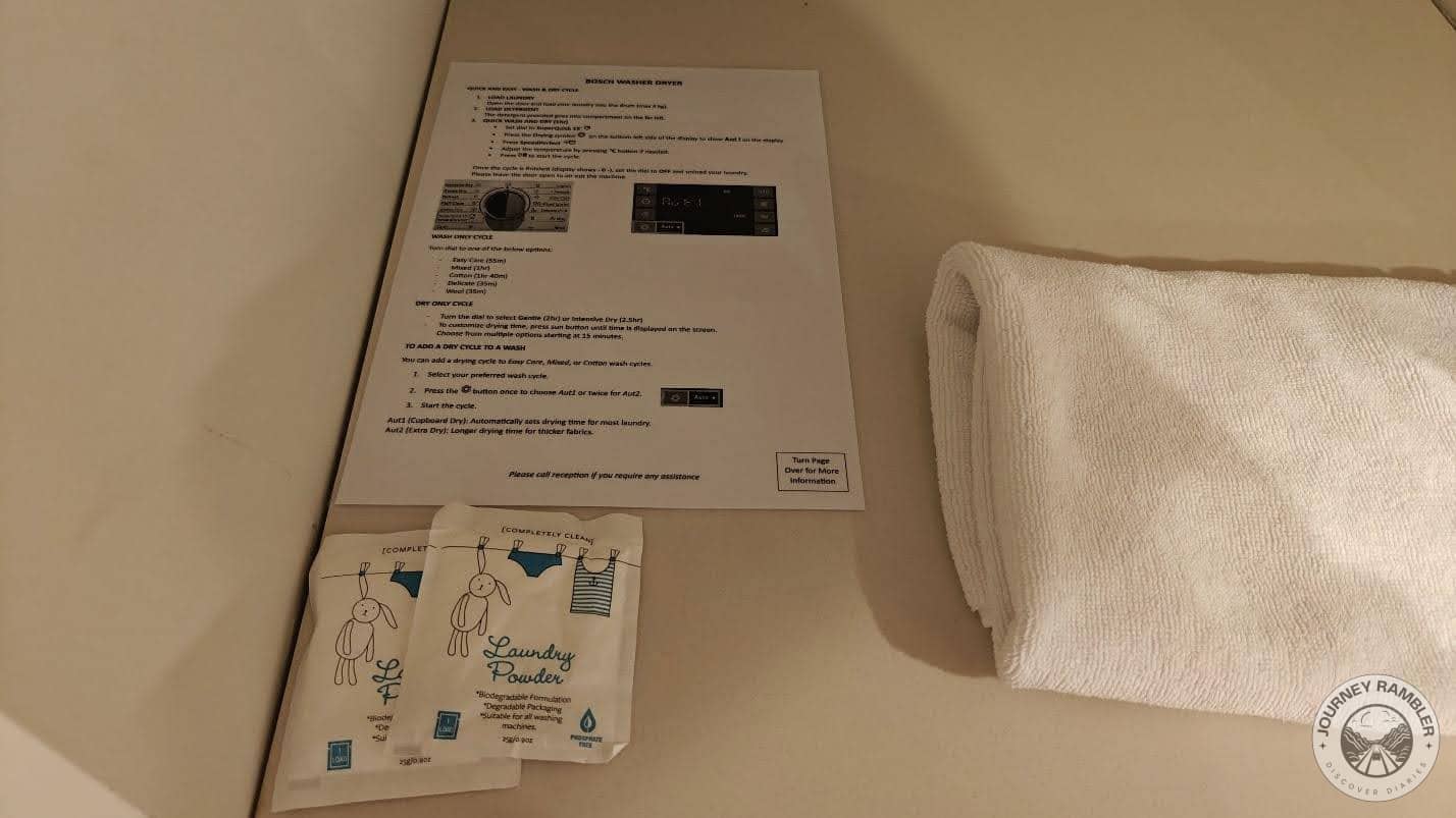 laundry powder and instructions about how to use the machine