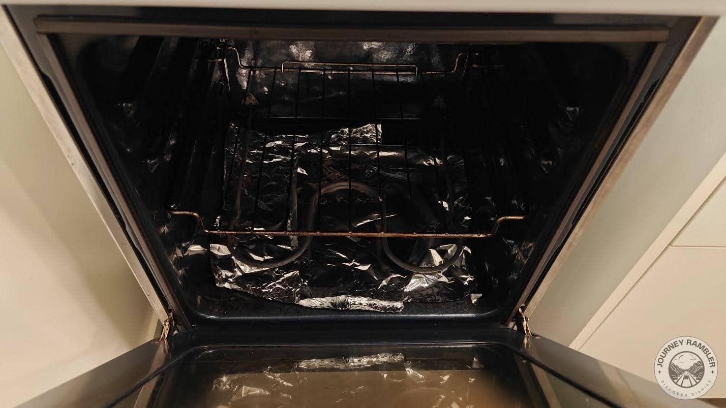 lined the bottom of the oven with aluminum foil