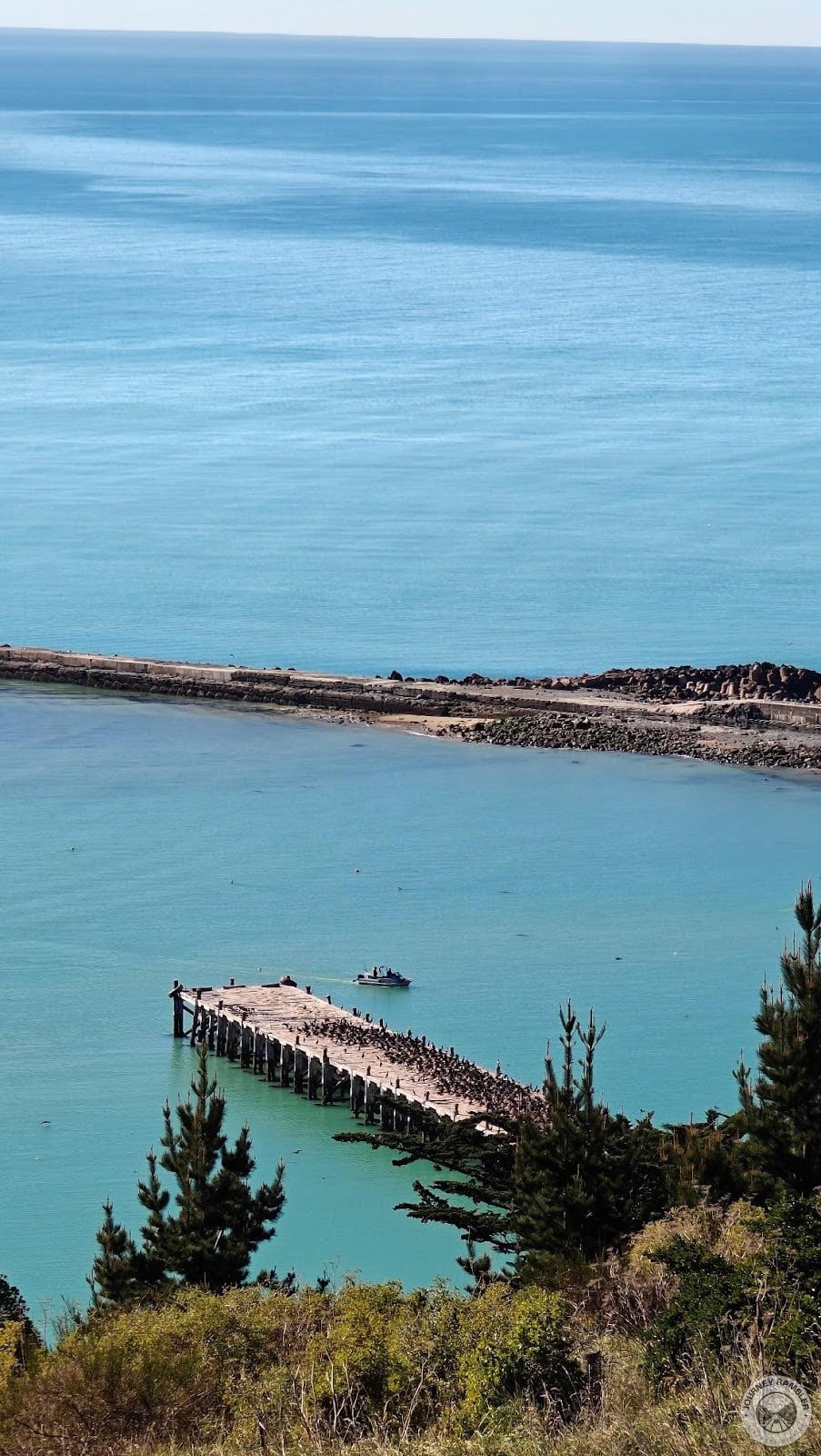 motorboat going past the wharf