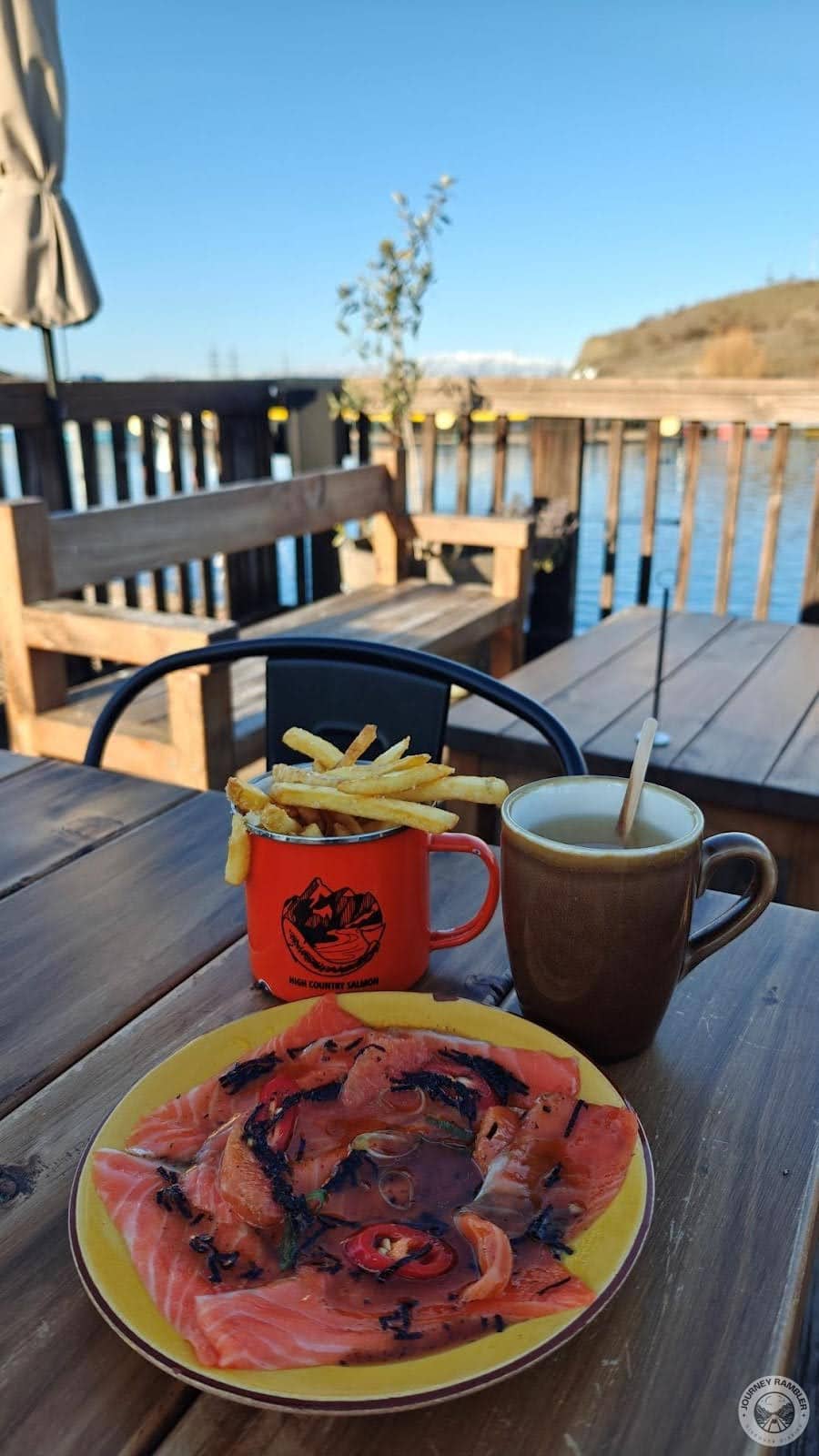 my sashimi, my plate of French fries and a mug of tea