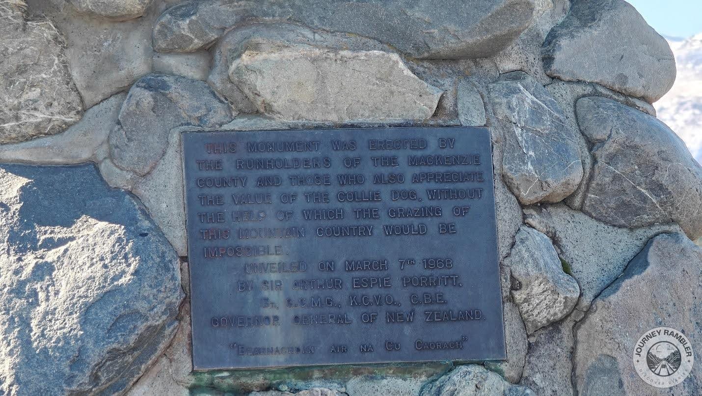 plaque below the statue