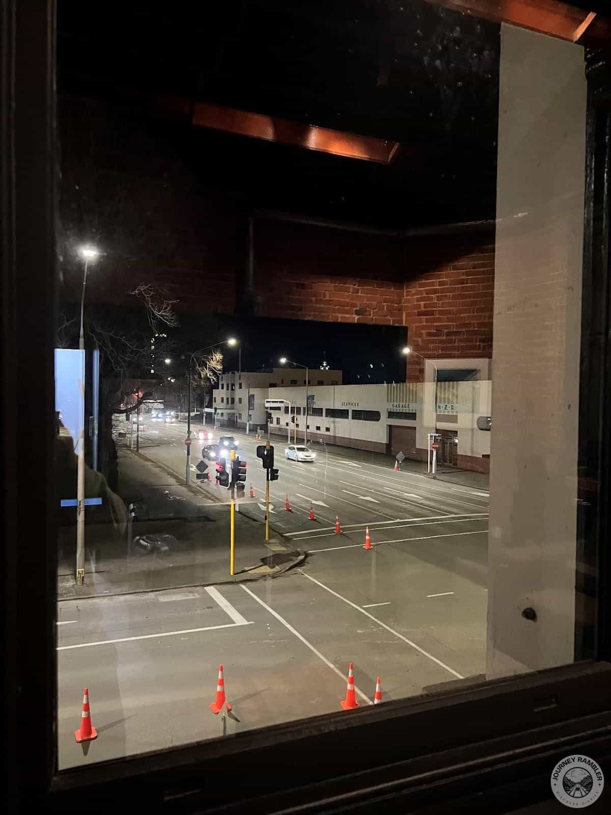 room had a huge window with a view of the main street outside