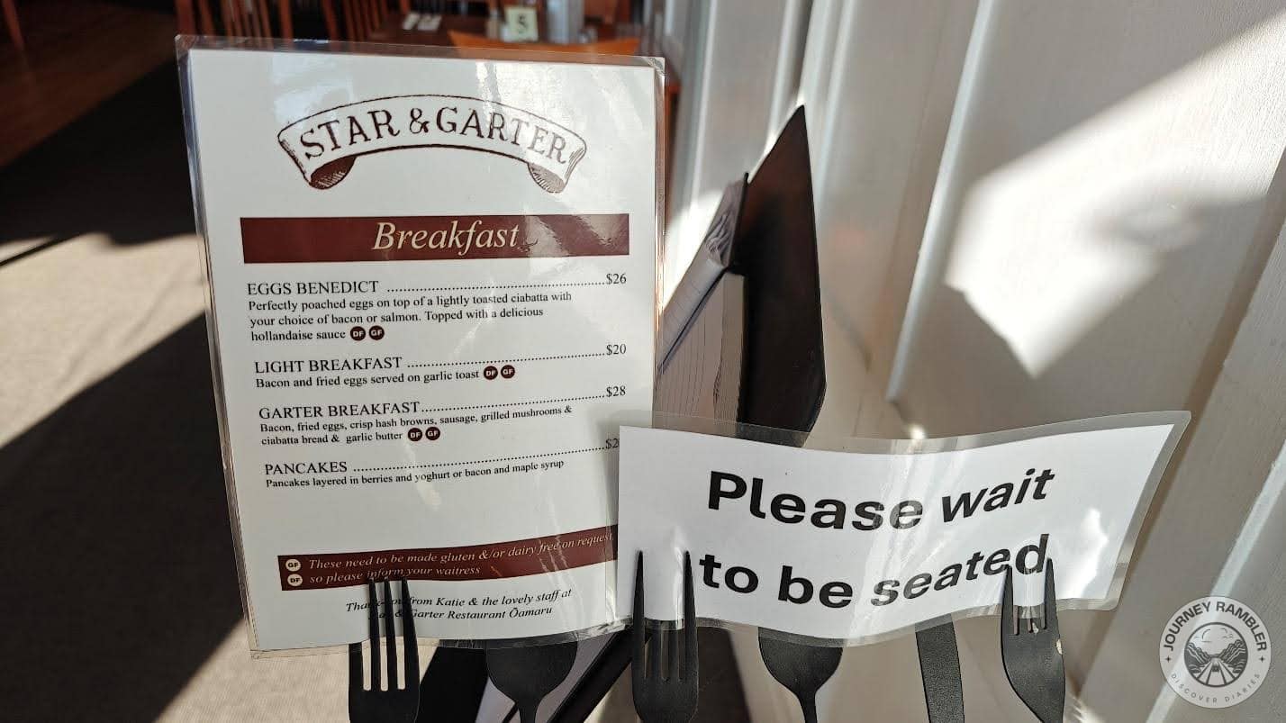 sign next to the breakfast menu asked visitors to wait to be seated