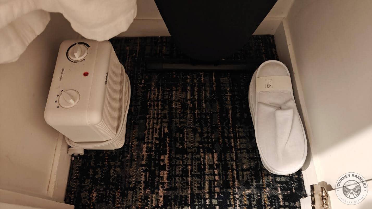 small heater and a pair of bedroom slippers