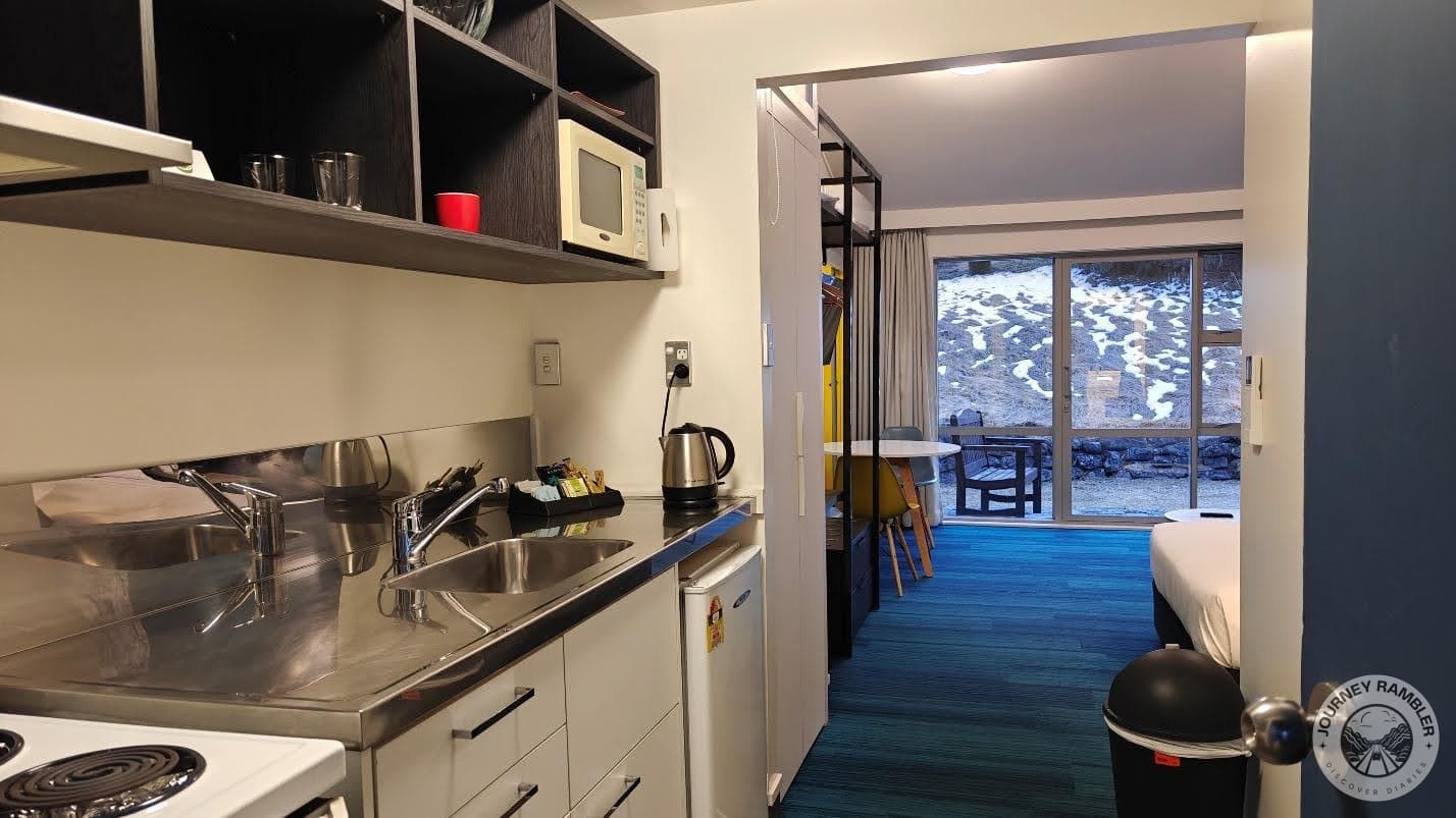 small kitchen along with the bedroom and bathroom