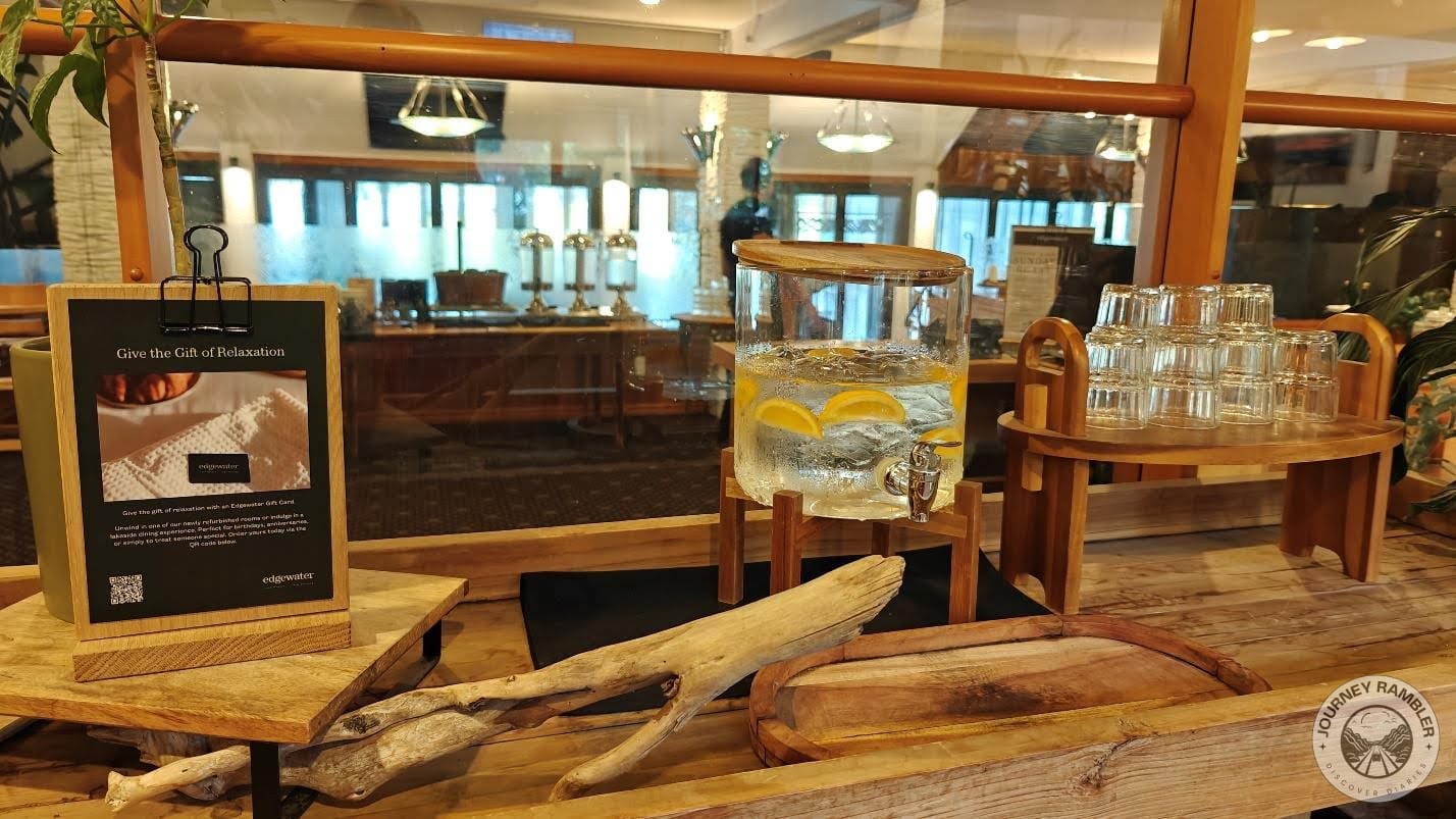 some water and glasses on a table