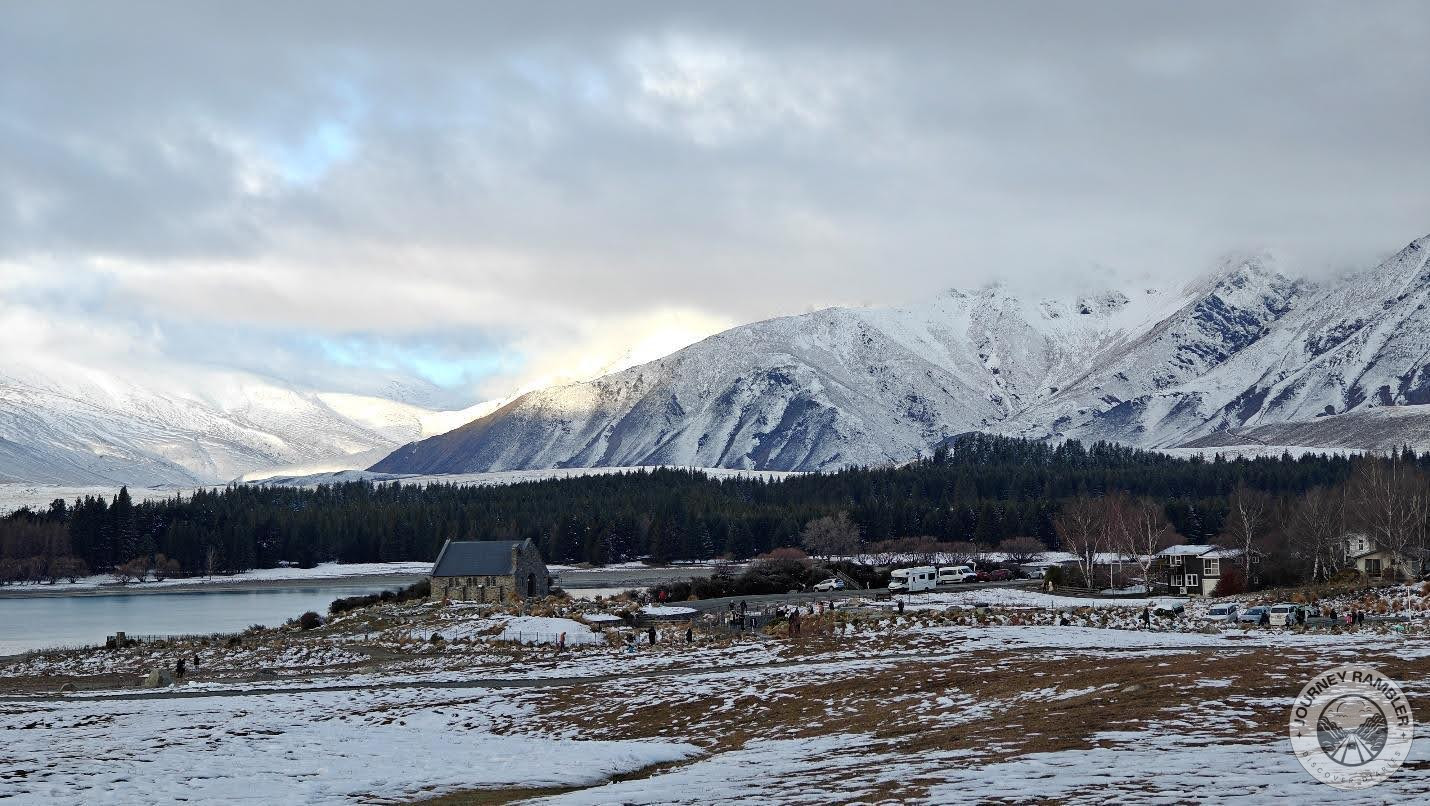 sun rising over the mountains east of the town