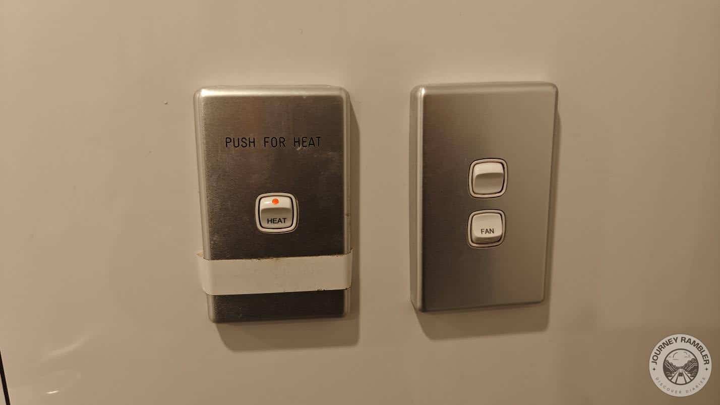 switches for the towel warmer and the fan