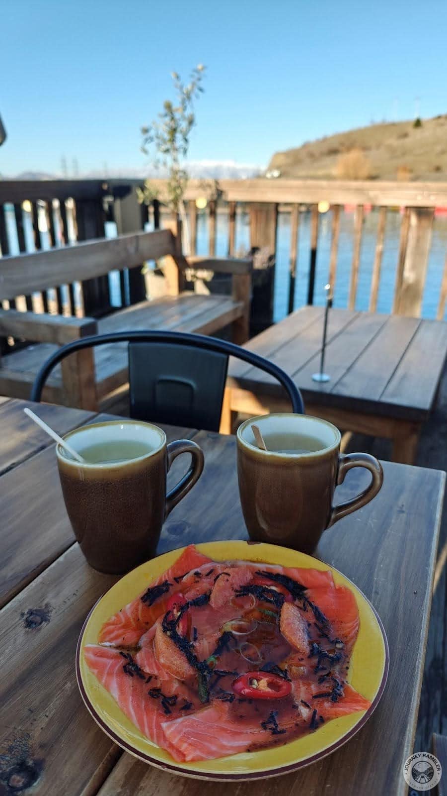 tea came out in large brown mugs and had stirrers inside