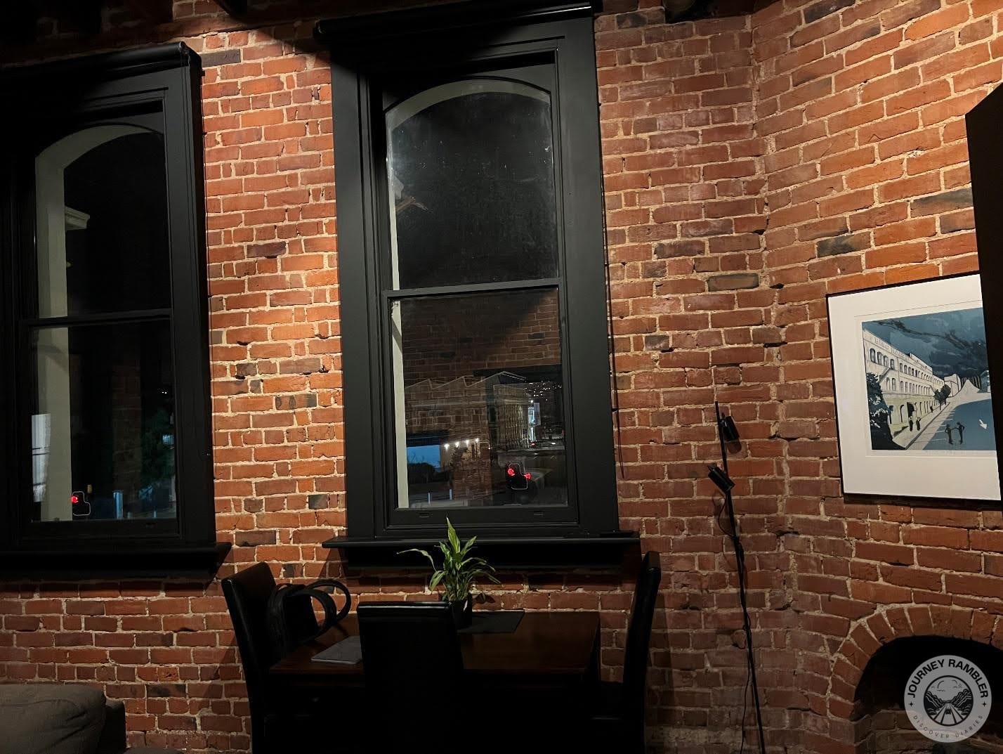 three person dining table beside the fireplace