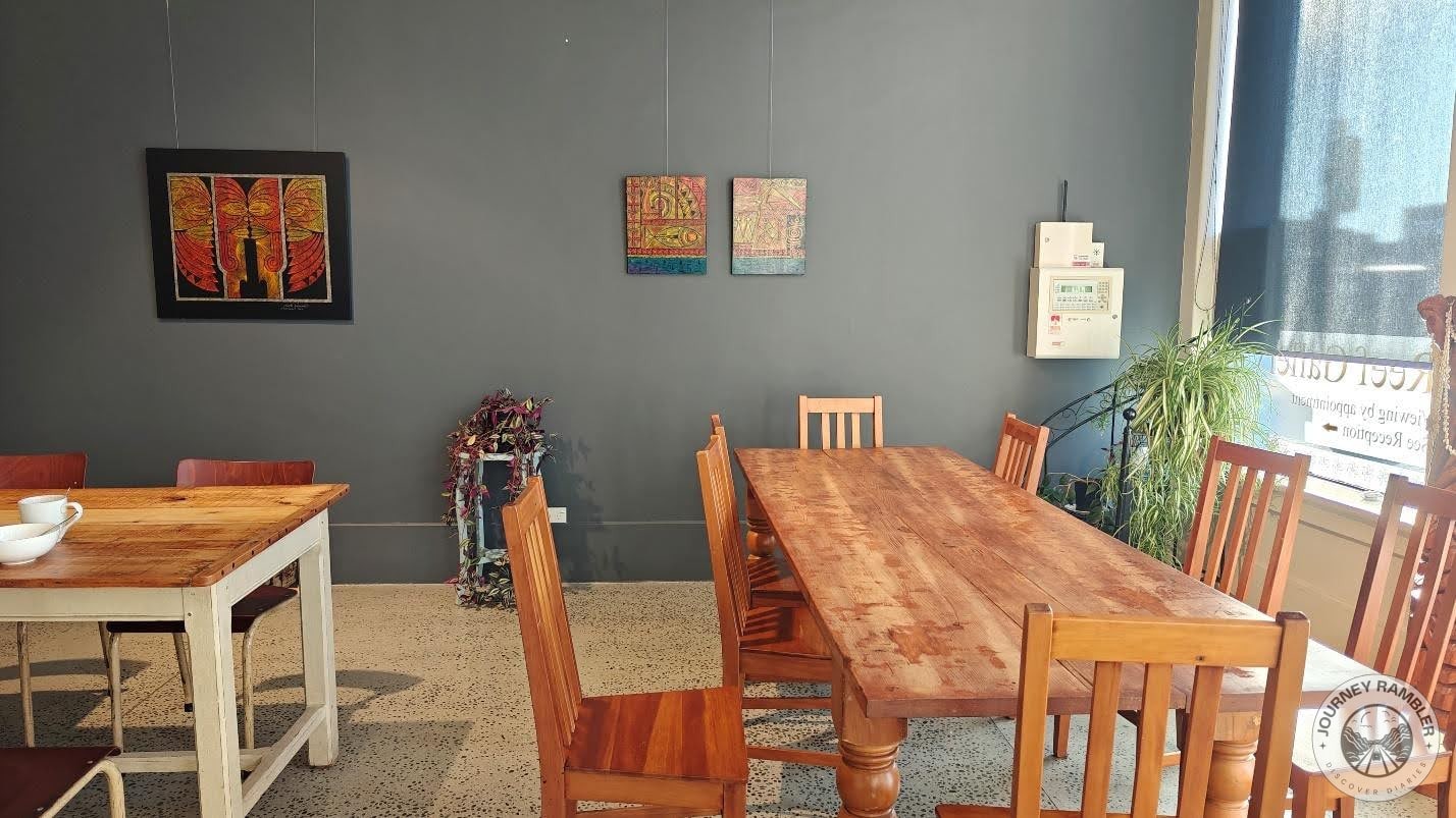 two wooden tables and chairs