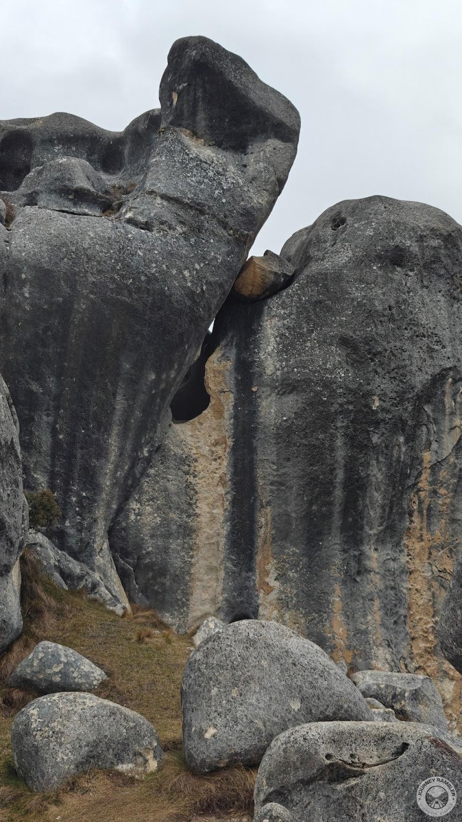 vertical stain on these rocks or patina