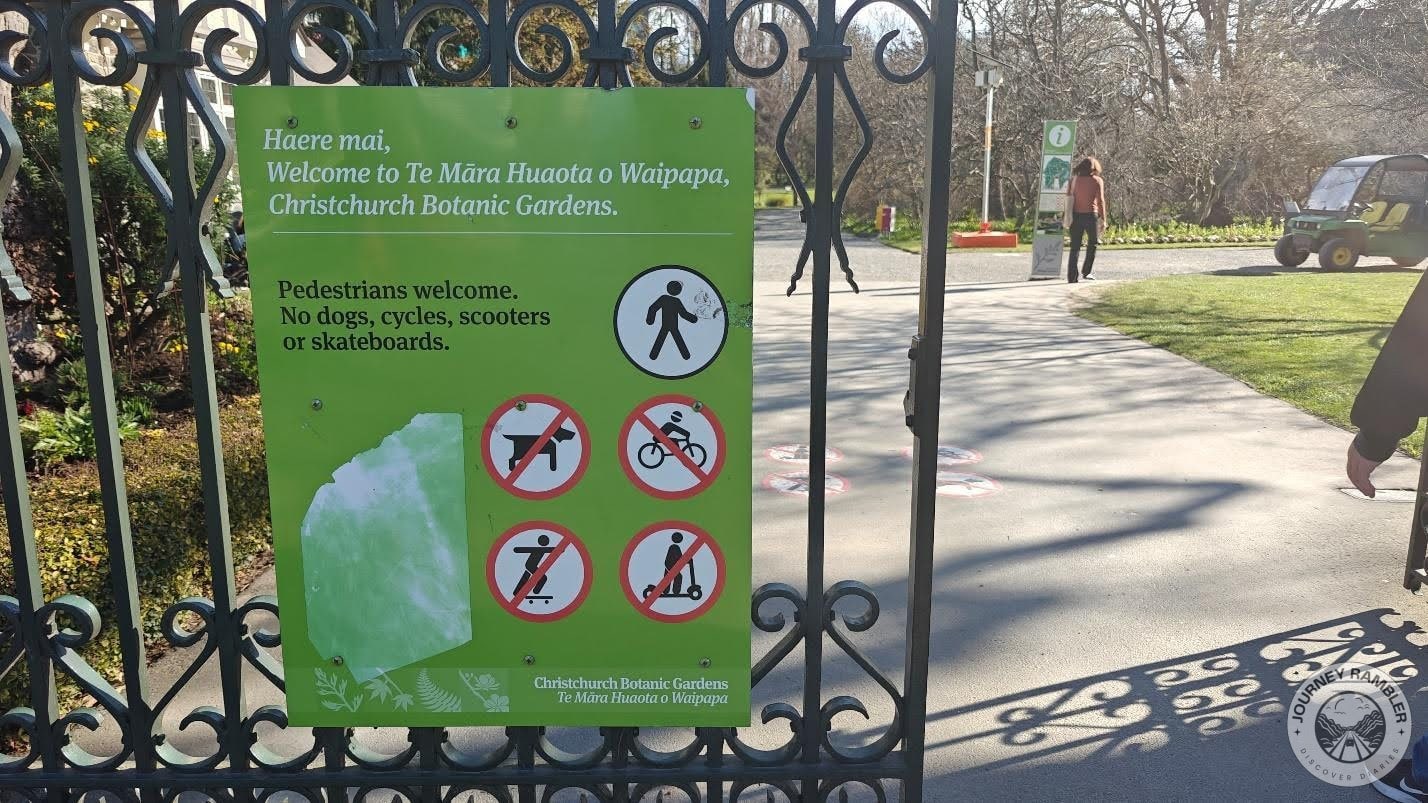 warning against the bringing of dogs as well as bicycles, skateboards, and scooters inside