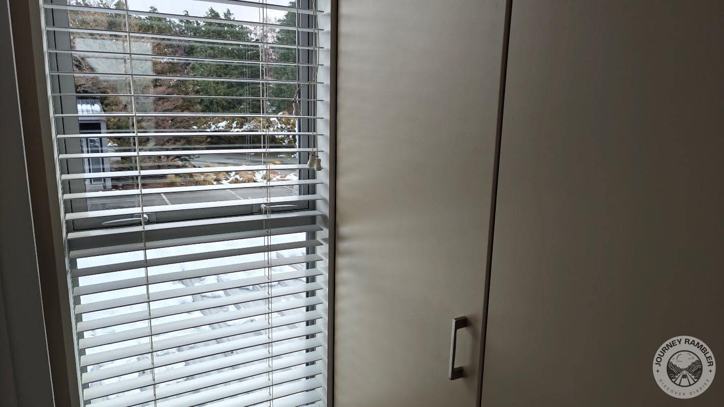 window beside the closet