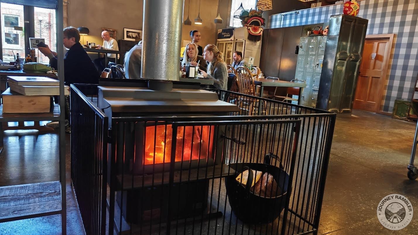 wood fire stove in the center of the room