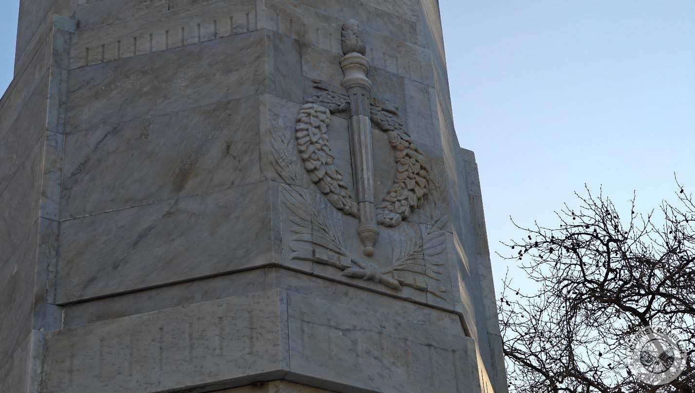 wreath carved on one side