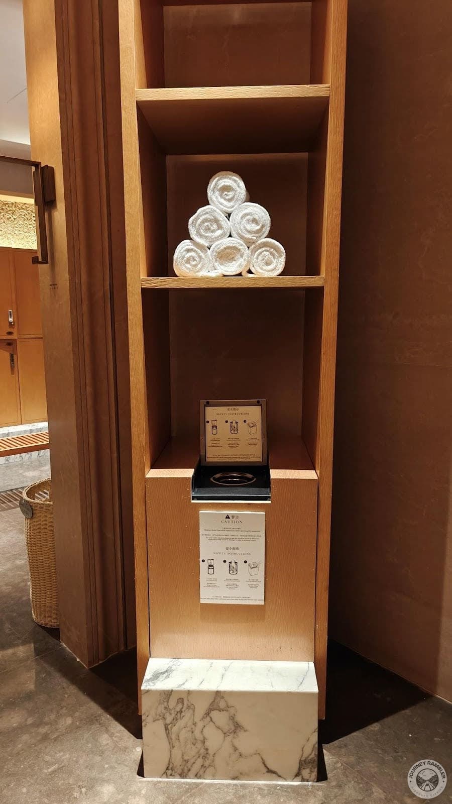 Fresh towels were stored on a shelf