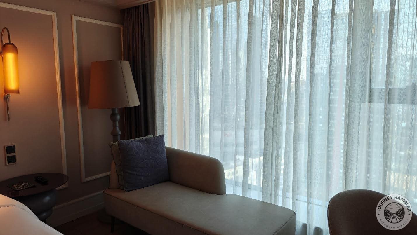 White sheer curtains had been pulled across the windows for privacy