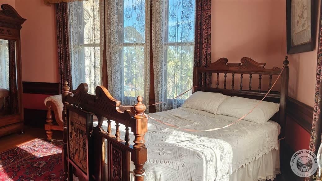 bed that had a painting attached to it