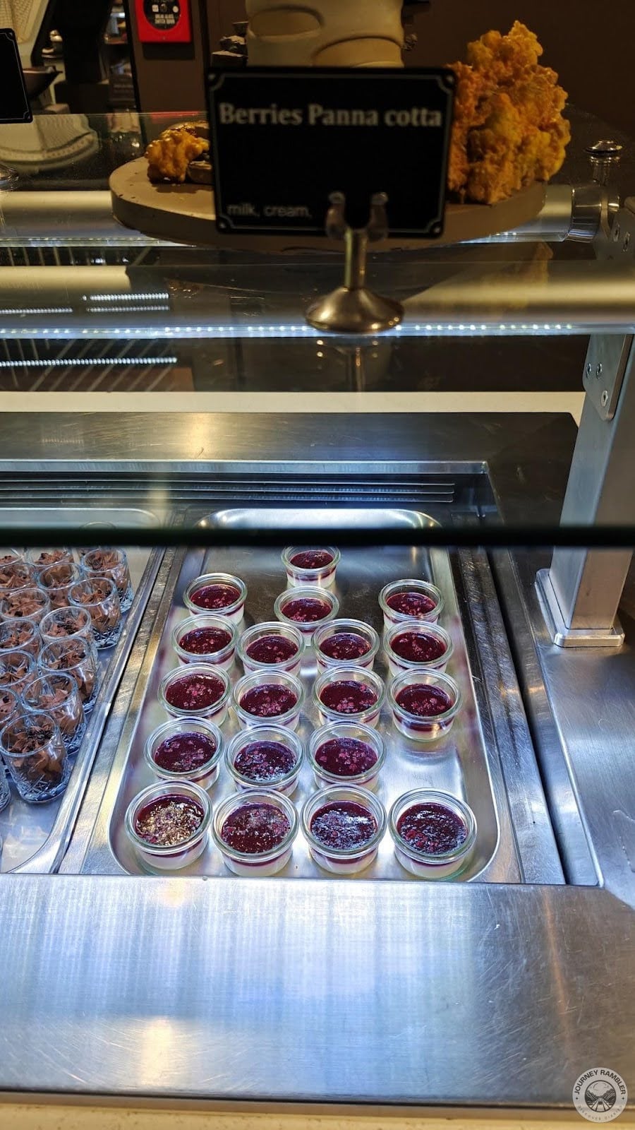 berry panna cotta with blueberry compote on top