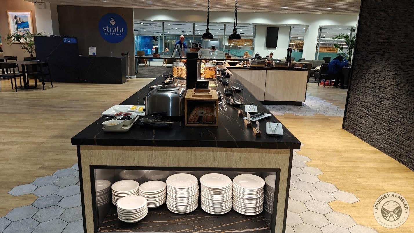 big island in the center filled with empty plates and food items