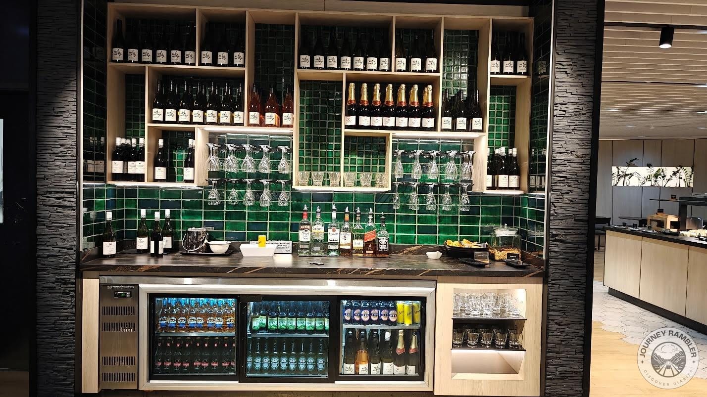bottles of all kinds of alcohol lined up neatly on the shelves