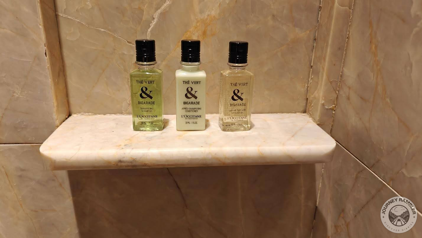 bottles of shampoo, conditioner and shower gel