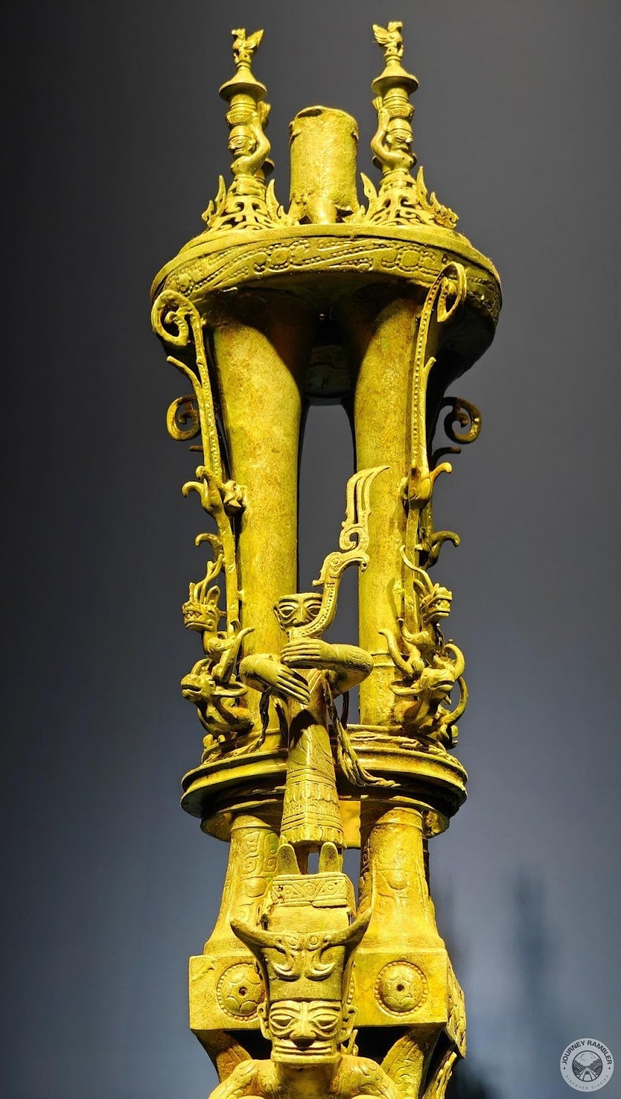 carving of some kind of ritual scene