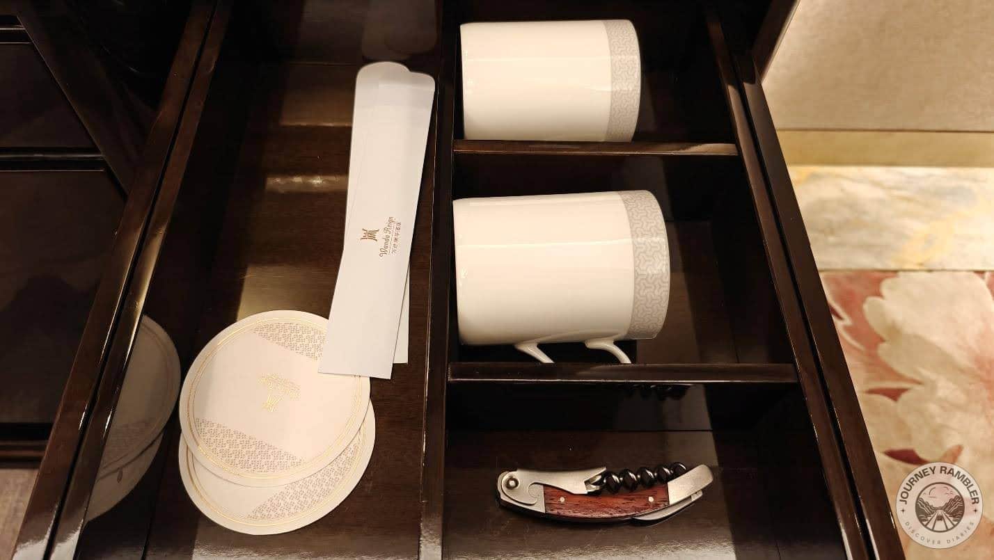 coffee mugs, coasters and a Swiss knife