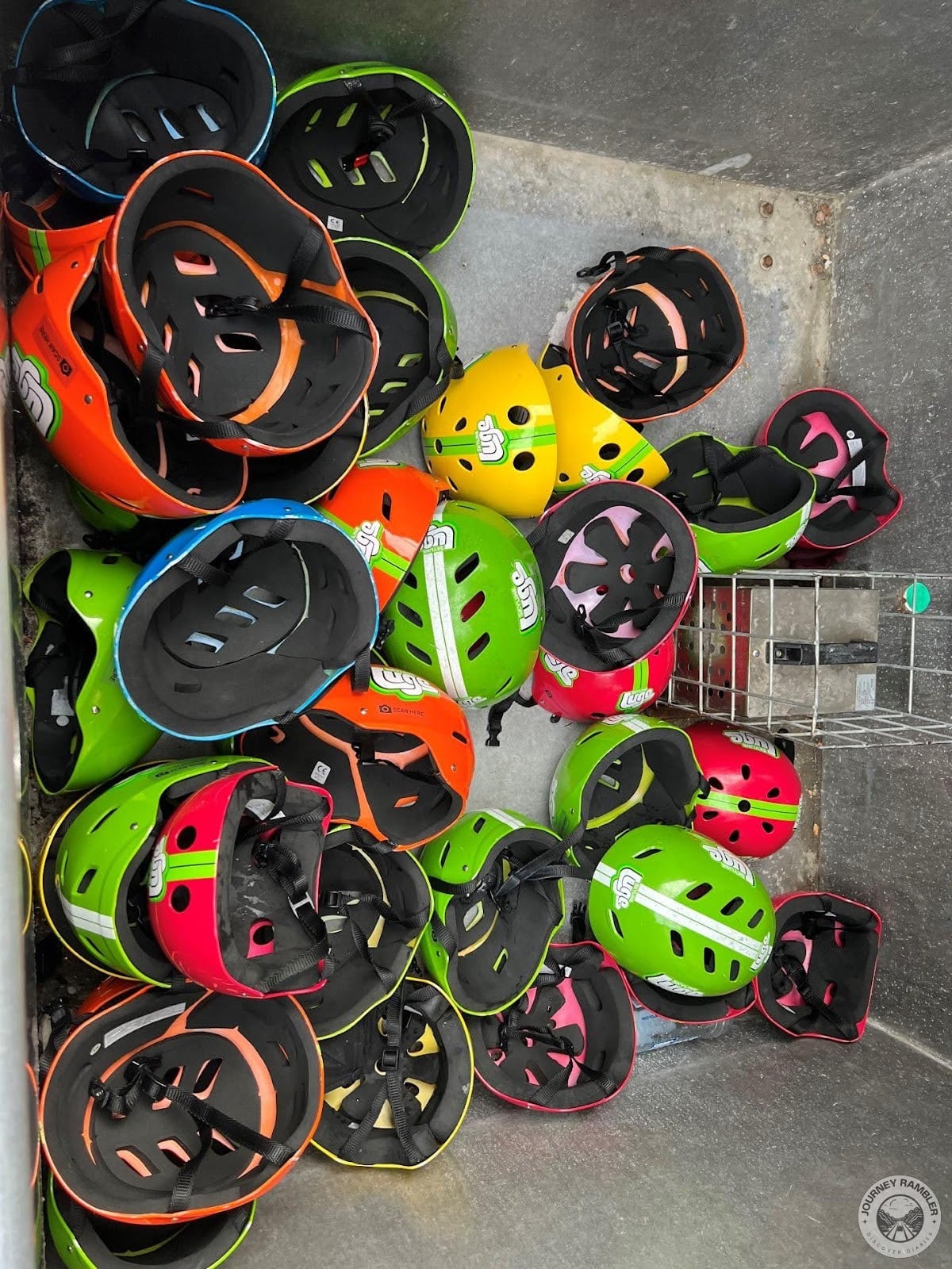 container filled with helmets