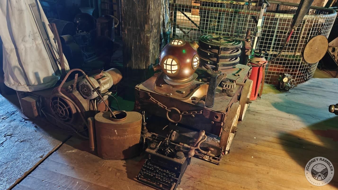 diving helmet laying around with a mish-mash of other tools and gadgets