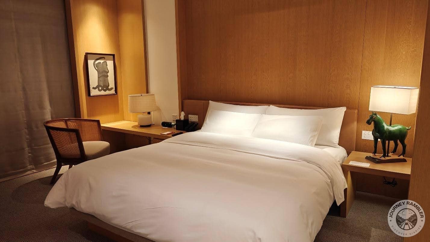 double bed with lots of comfortable pillows