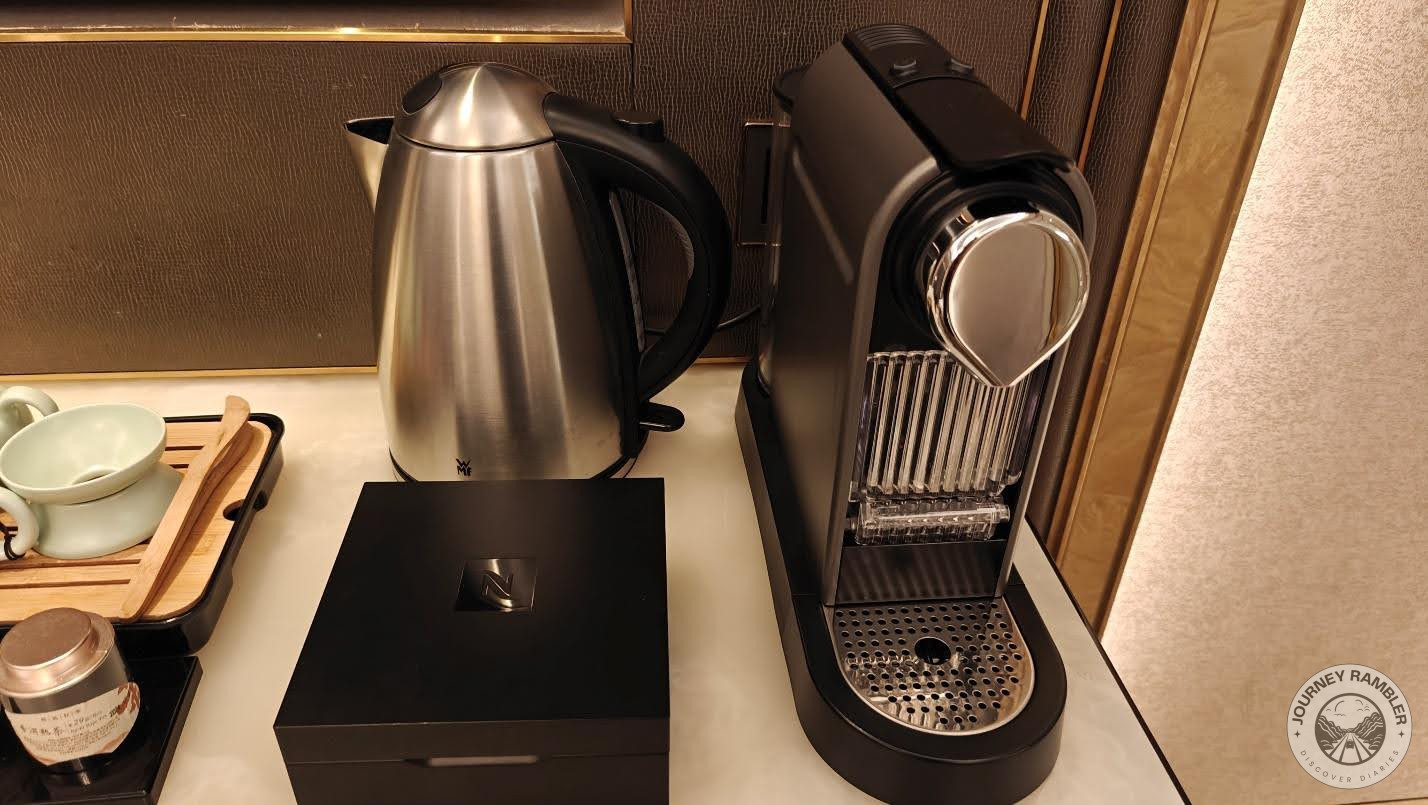 espresso machine and a big electric kettle at the mini bar