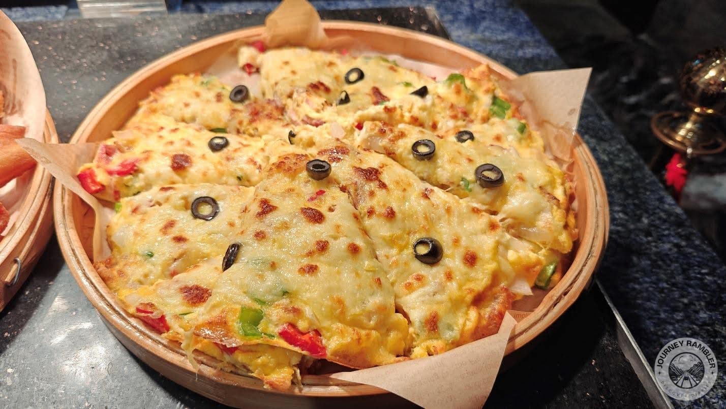 extremely cheesy pizza